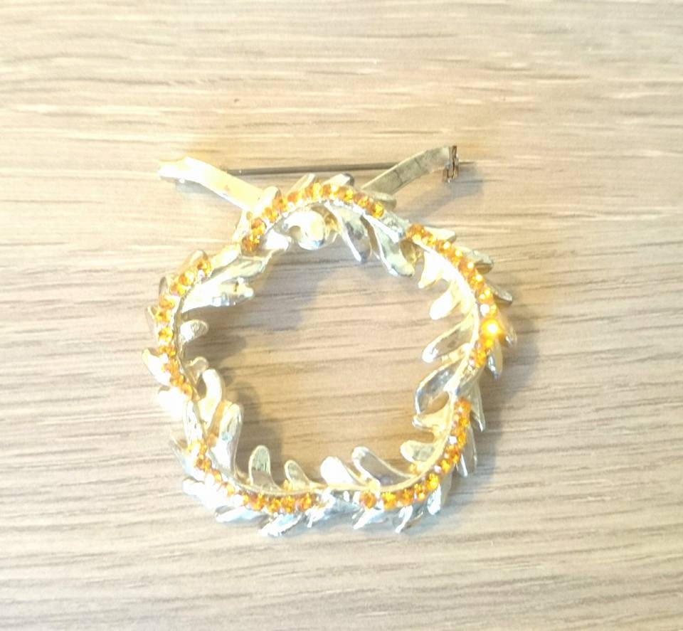 Vintage Gold Tone Scarf Brooch with Orange Rhinestones