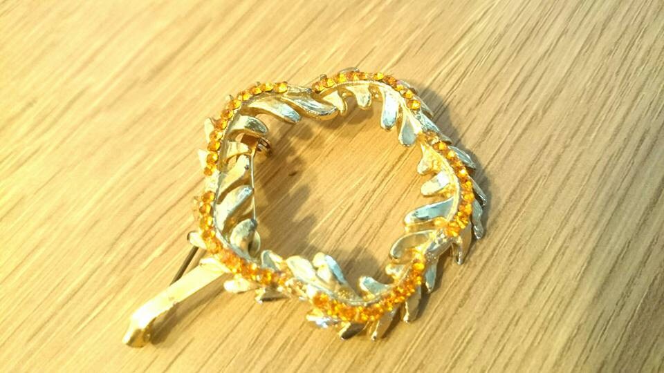 Vintage Gold Tone Scarf Brooch with Orange Rhinestones
